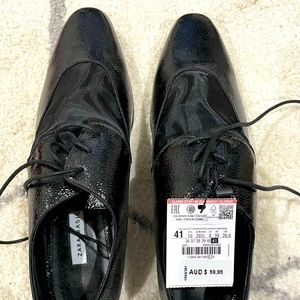 Black flat loafer